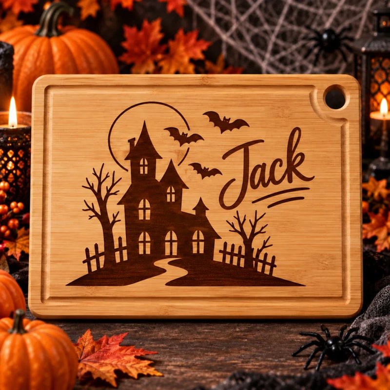 Empty_Halloween_haunted_house_engraved_board_with_spiders_and_leaves