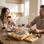 Couple_enjoying_wine_and_loaded_charcuterie_board_at_dining_table