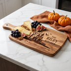 Halloween_haunted_house_engraved_board_with_cheese_and_figs_on_counter