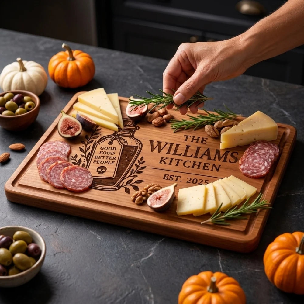 Hand_adding_rosemary_to_Williams_Kitchen_engraved_charcuterie_board