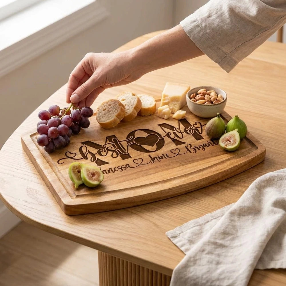 Hand_taking_grapes_from_Mom_best_ever_engraved_charcuterie_board