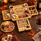 Loaded_Halloween_ghost_expandable_cheese_board_on_dark_wood_table