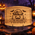 Upright_Halloween_pumpkin_candy_basket_engraved_board_on_metal_stand
